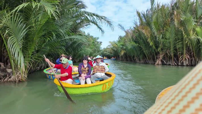 Round basket boats among the nipa palms in the Bay Mau coconut forest near Hoi An