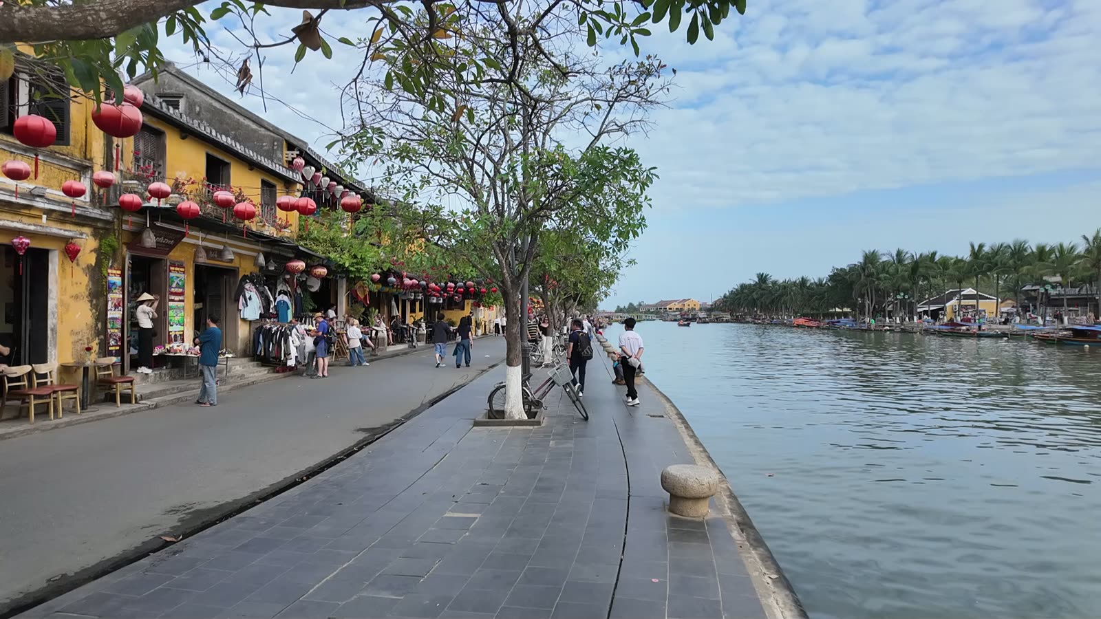 The riverfront in Hoi An Ancient Town in the late afternoon, before the lanterns are lit