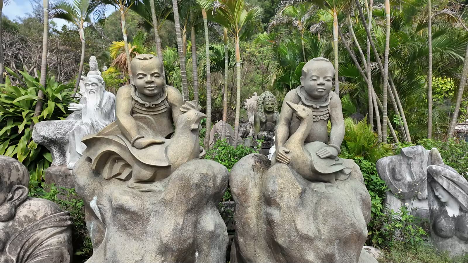 Carved stone figures on display beside the Marble Mountains, Da Nang