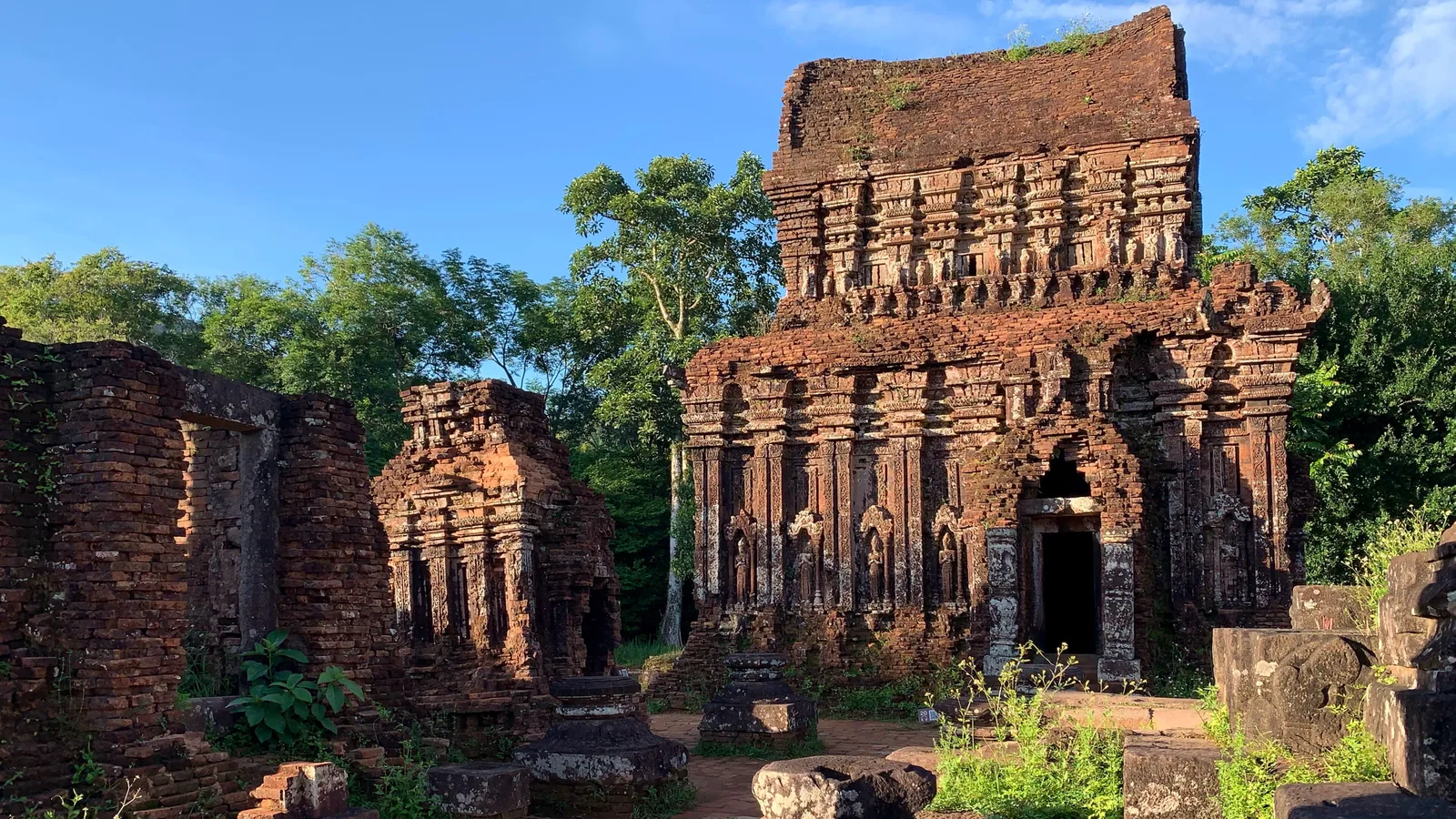 Brick Cham temple towers among trees at the My Son Sanctuary near Hoi An